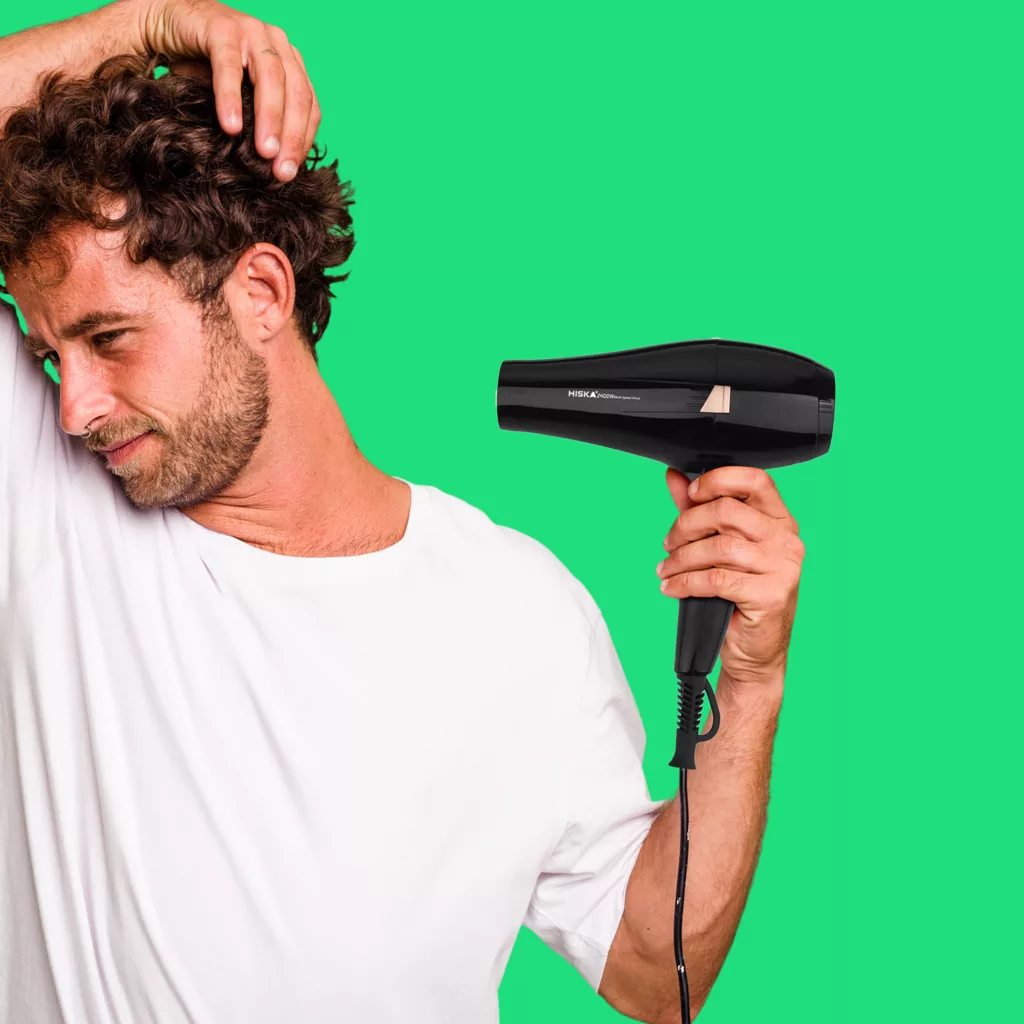 سشوار حرفهای هیسکا مدل H5253، موتور AC با توان مصرفی 2400 وات، دارای قابلیت باد سرد، فناوری تولید یون، حلقه آویختن، با حالت فرکننده، صافکننده و حجمدهنده، وزن 1100 گرم، تنظیم حرارت 3 حالته و کنترل سرعت 2 حالته، به همراه 2 عدد سری متمرکزکننده