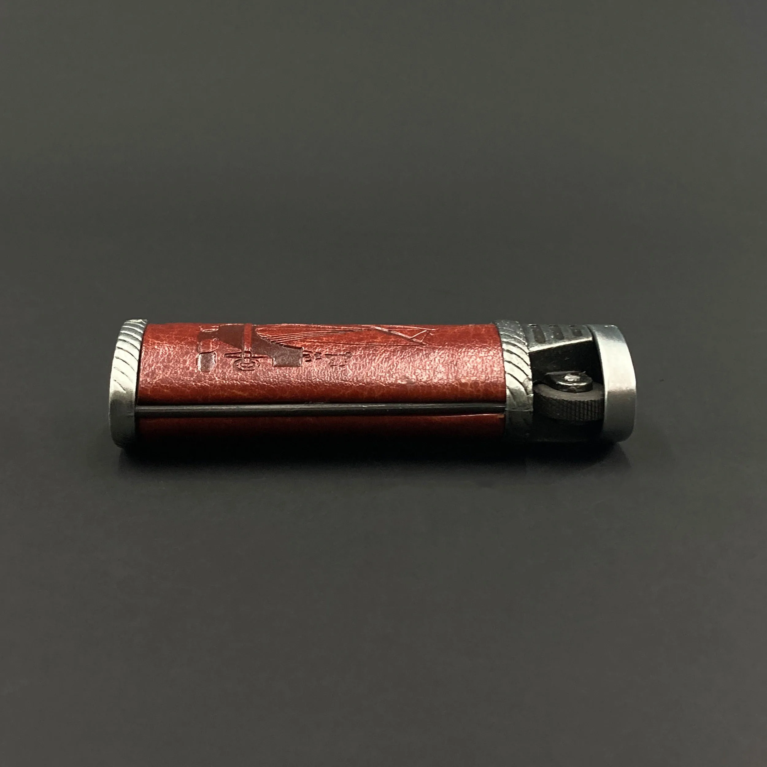 فندک مدل سنگی چرمی طرح قایق کد DKD-1519
